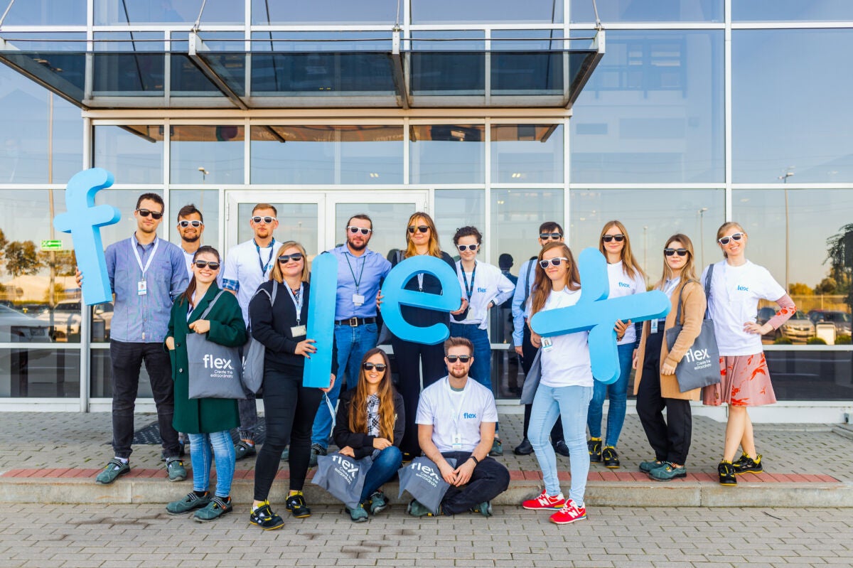 Young team of interns and apprentices with Flex logo